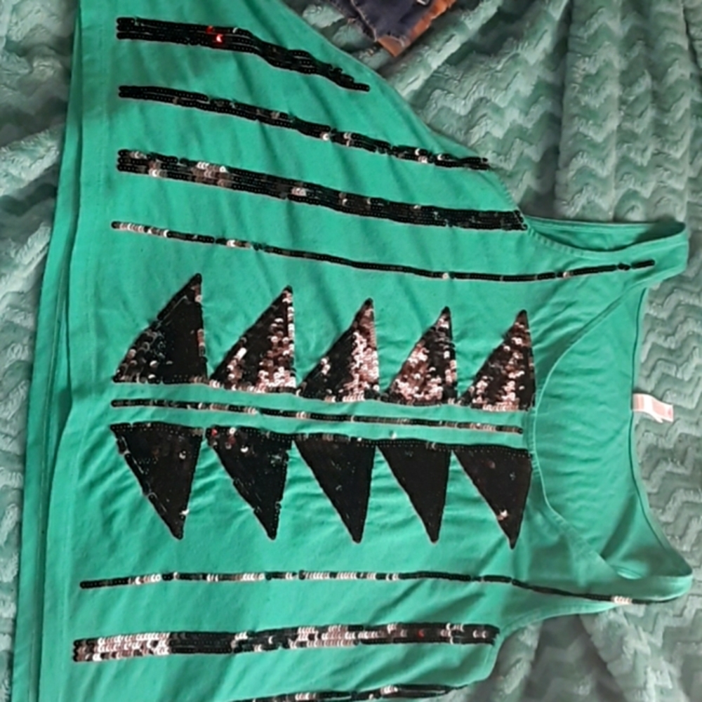 Loose fitted tank top with a flared out bottom